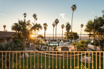 The guest room balcony leading to the pool